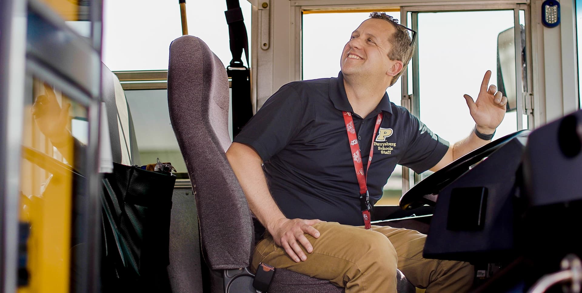 Bus driver smiling